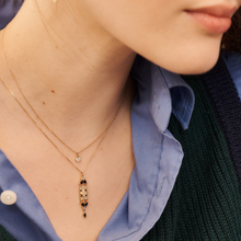 Load image into Gallery viewer, collier petit coeur en or jaune 18 carats et diamant taillé porté 2
